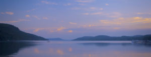 Boats on Cayuga Lake with a Pink Sunset